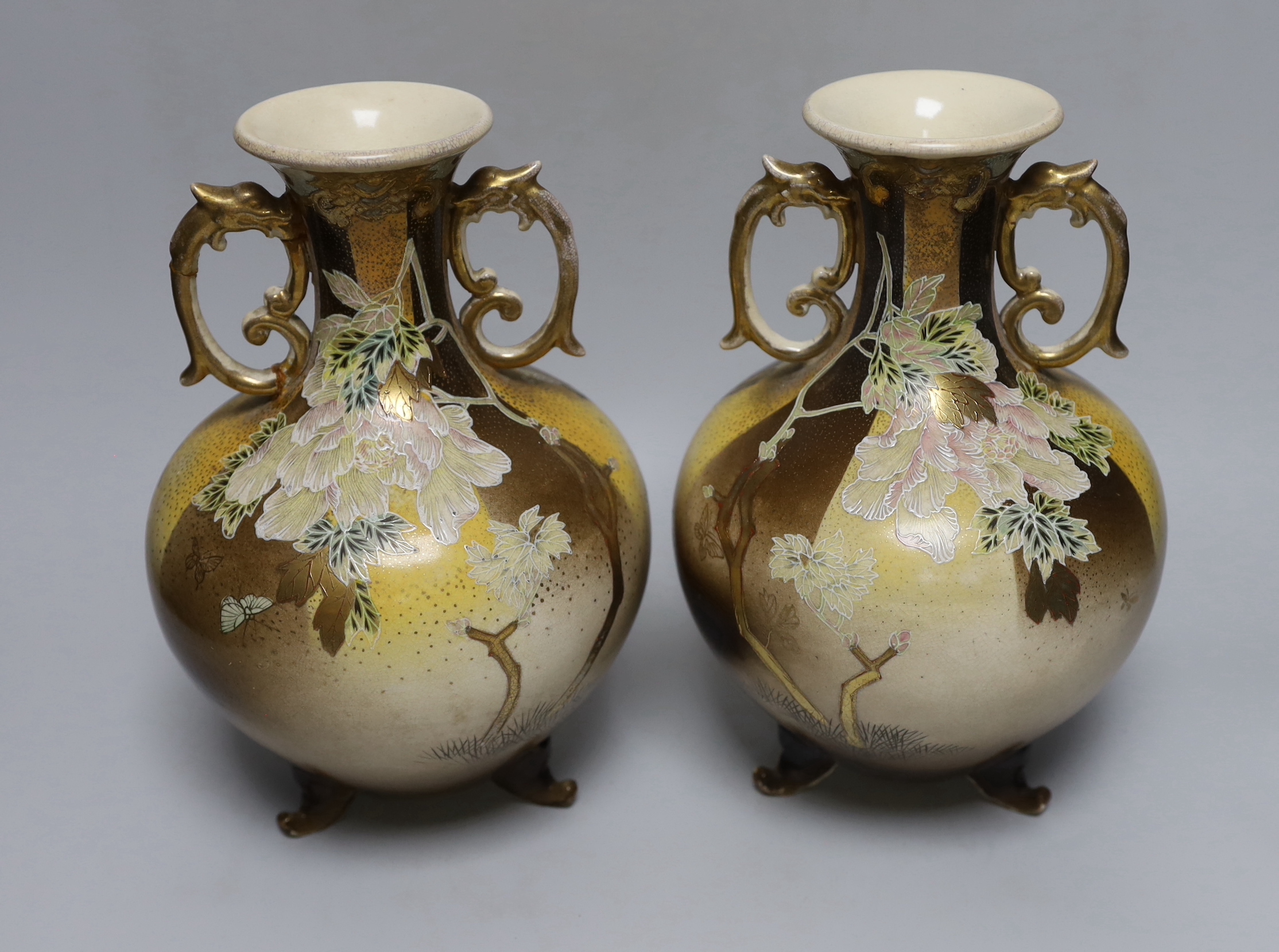 A pair of Japanese Satsuma pottery vases, 26cm
